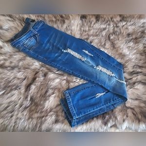 Skinny Distressed Mid Rise Jeans